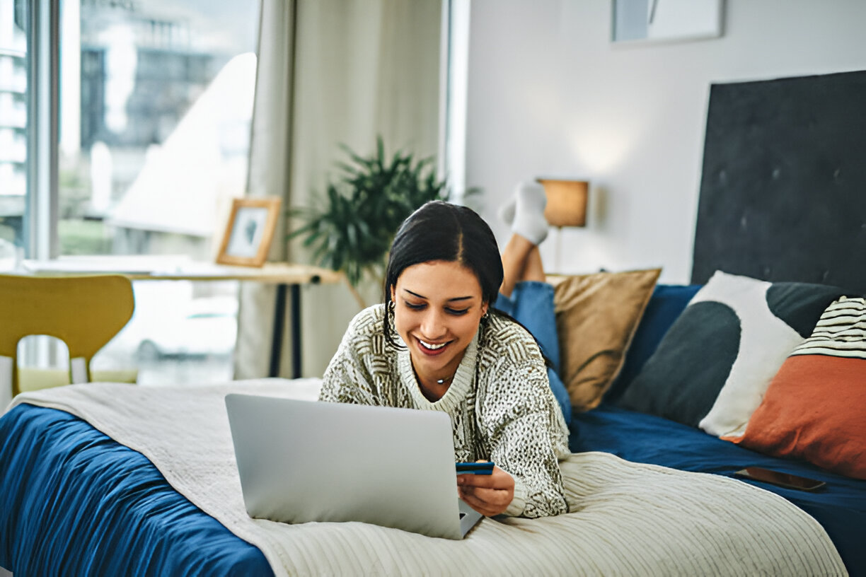 A woman using her laptop to shop online